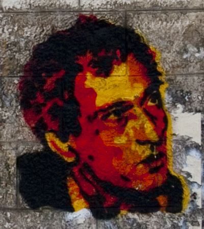 A commemorative mural portrait of Palestinian cartoonist Naji al-Ali in Ramallah, photographed in 2012