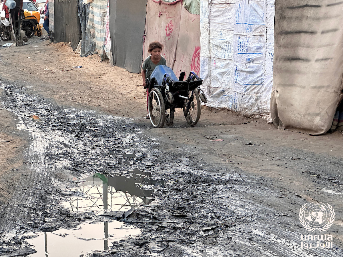 Sewage water surrounding displaced persons’ tents in Deir al-Balah Gaza August 2024
