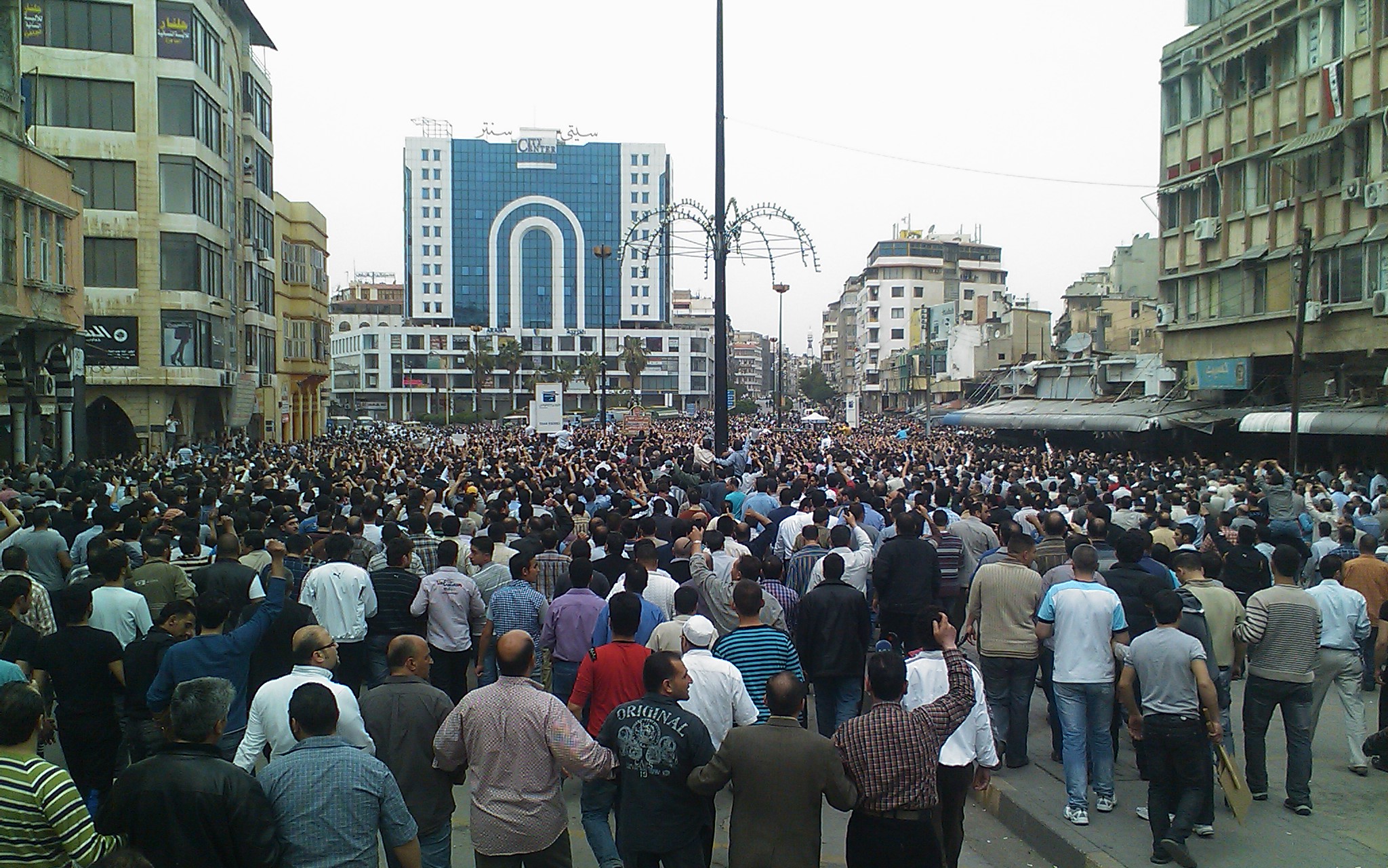 People demonstrating against President Bashar al-Assad in Homs in April 2011